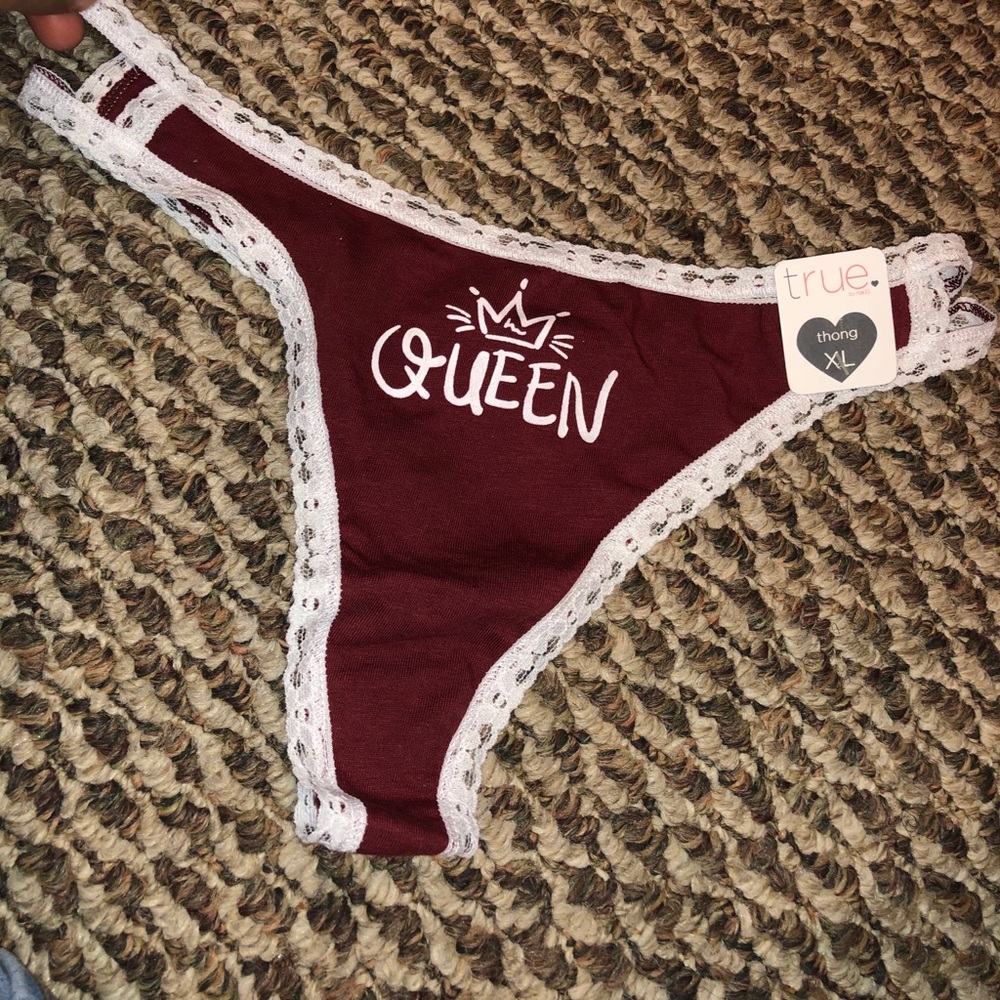 Burgundy and white thong with “Queen” on the front